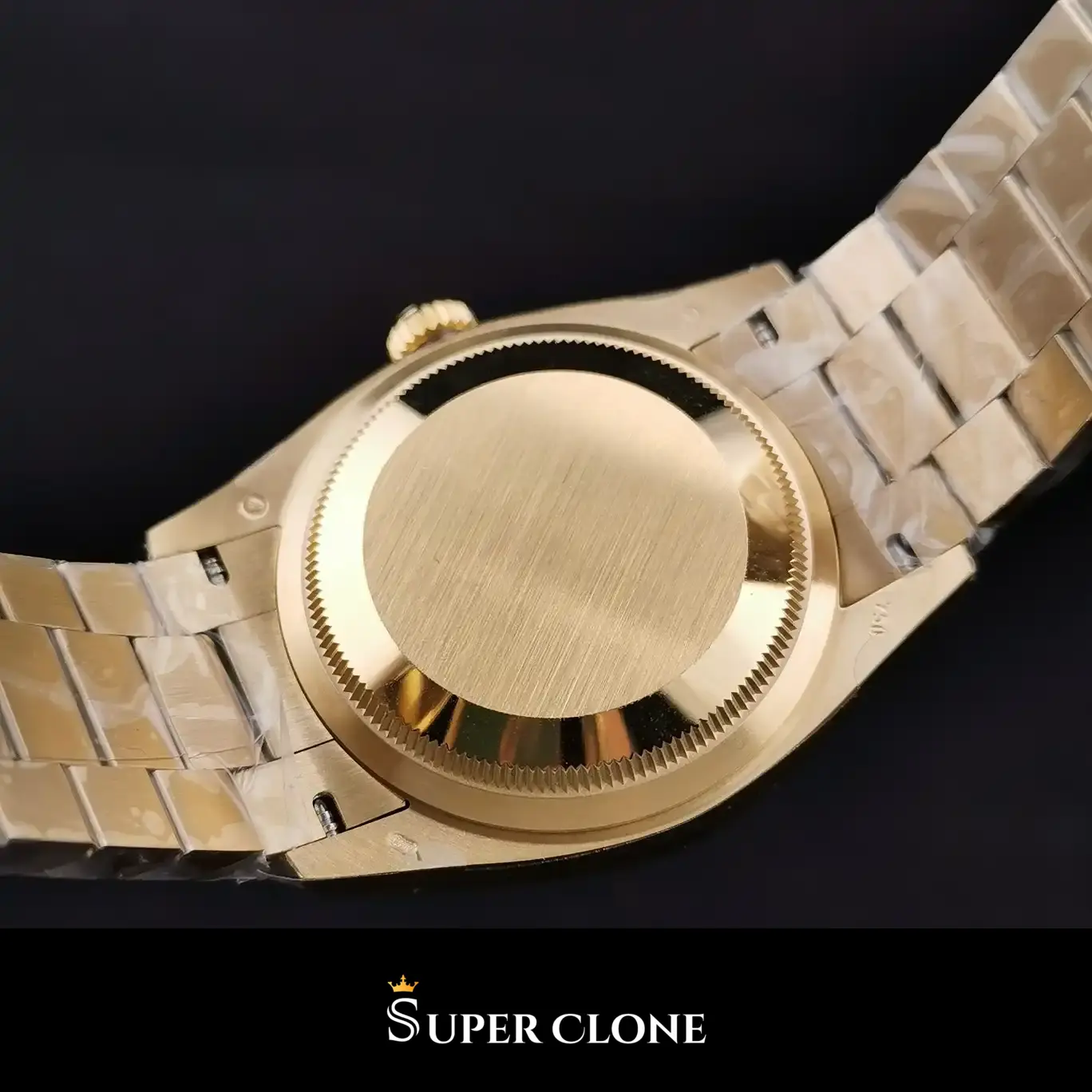 Rolex Day-Date 128238 replica, macro del bisel acanalado dorado