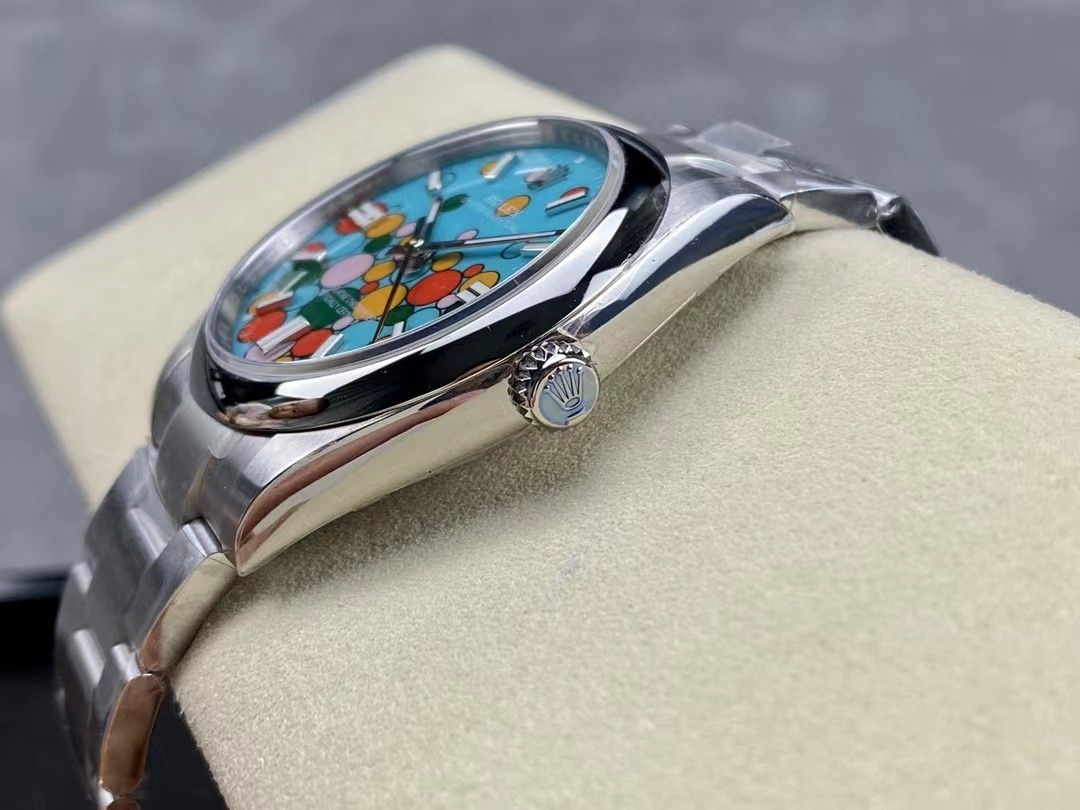 Rolex Oyster Perpetual 124300 replica, macro del bisel, esfera Motivo Celebration