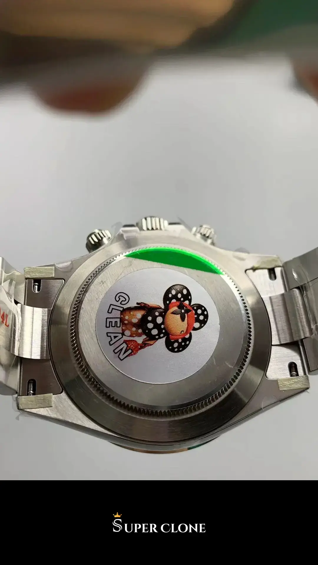 Rolex Daytona 116520 replica esfera blanca, vista lateral